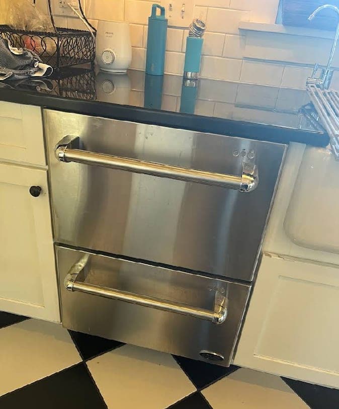 Fisher & Paykel dishwasher repair in Arlington, VA — Lower drawer stopping mid-cycle, error displayed, standing water not draining