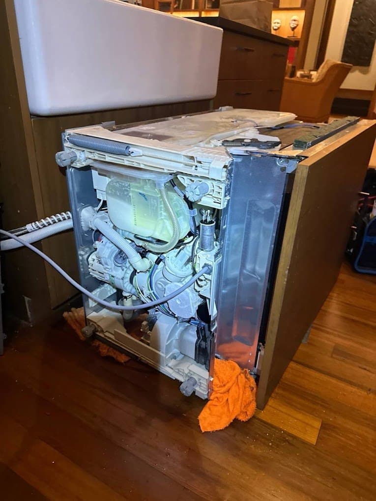 ASKO dishwasher repair in Sterling, VA — Dishwasher door dropping open hard