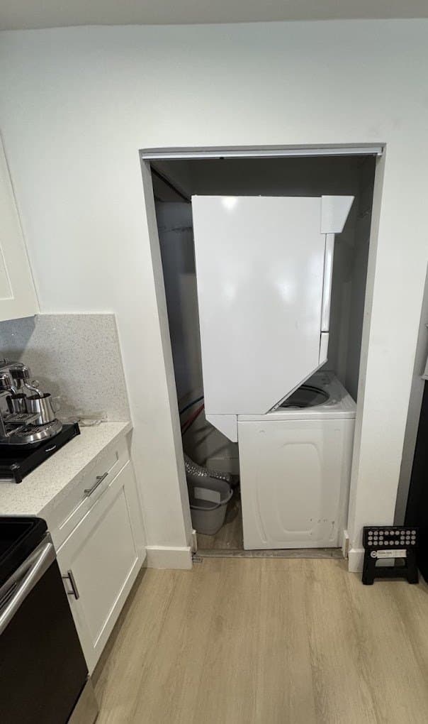 Frigidaire laundry combo repair in Rockville, MD — Laundry center dryer noisy