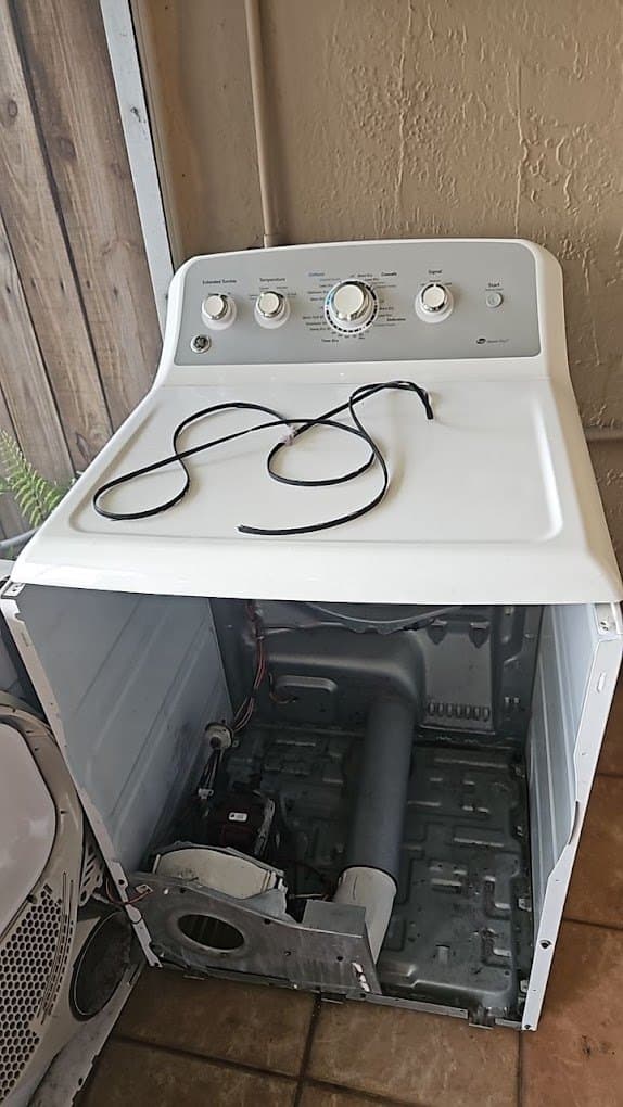 GE dryer repair in Centreville, VA — Dryer thumping as it ran