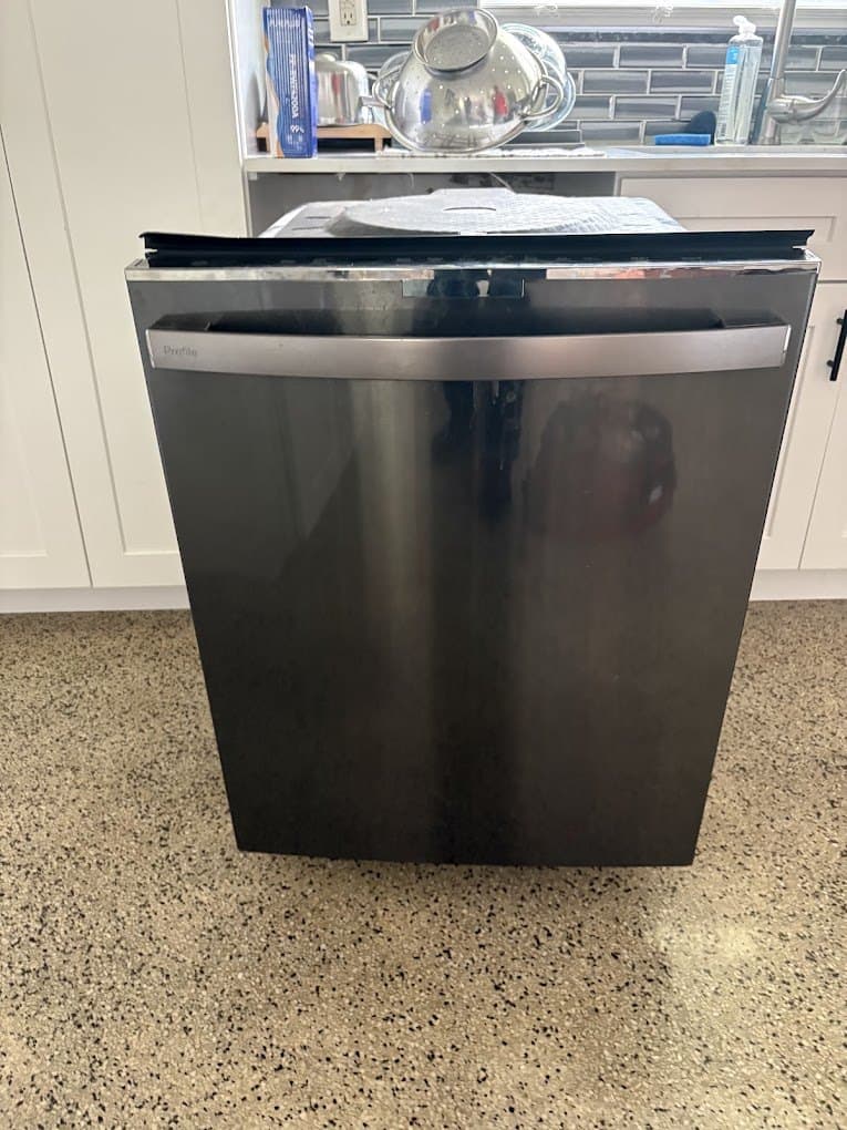 GE Profile dishwasher repair in Leesburg, VA — Dishwasher leaking underneath