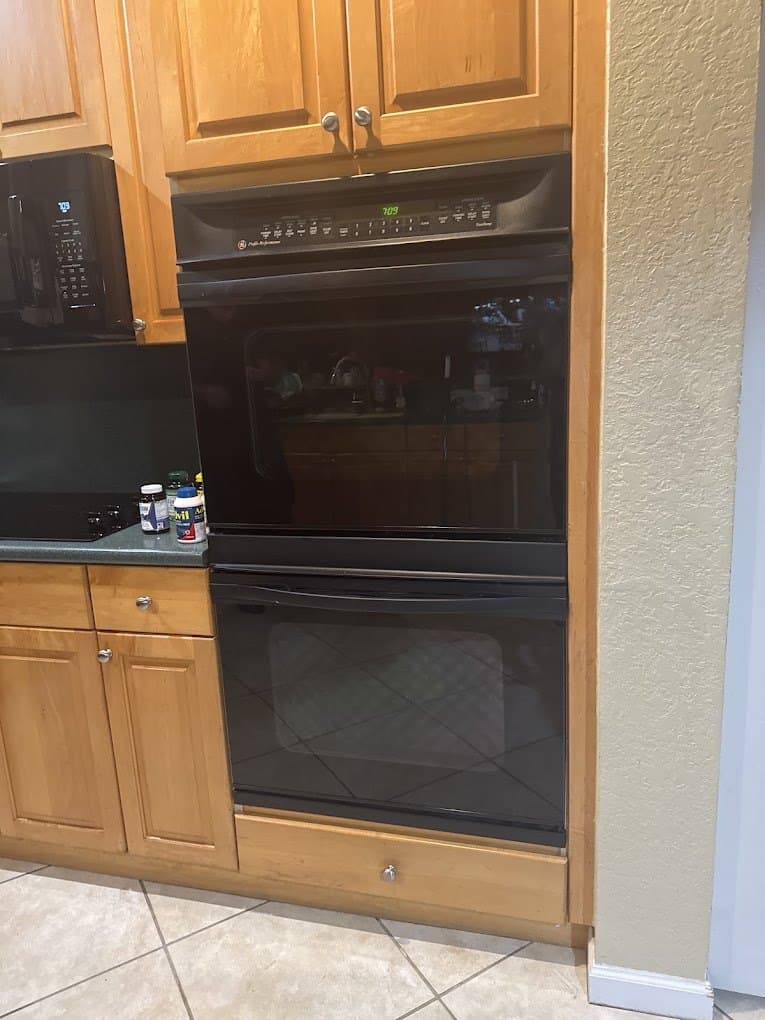 GE Profile oven repair in Arlington, VA — Upper oven heating, lower oven cold