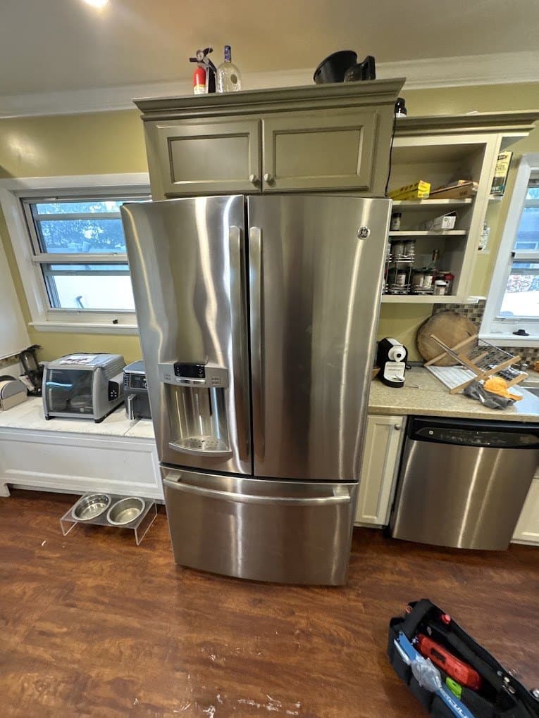 GE refrigerator repair in Ashburn, VA — Ice maker and water dispenser both stopped