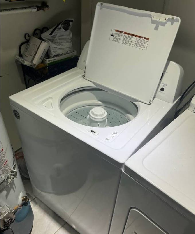 GE washer repair in Great Falls, VA — Agitator stopped moving mid-cycle, clothes completing the full wash soaking wet and unwashed