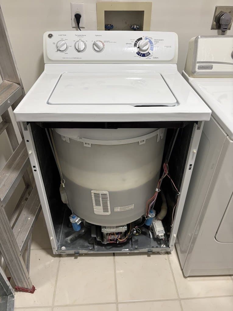 GE washer repair in Lake Barcroft, VA — Top-load washer filling while switched off