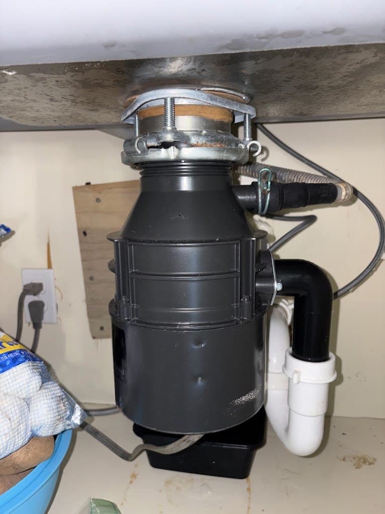 InSinkErator garbage disposal repair in Springfield, VA — Garbage disposal humming, not grinding