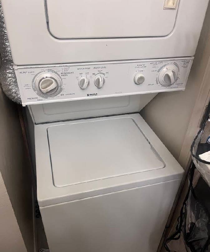 Kenmore laundry combo repair in Great Falls, VA — Washer not draining, drum leaving clothes soaking wet