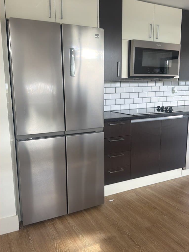 Kenmore refrigerator repair in Springfield, VA — Four-door refrigerator icing up inside the freezer drawer
