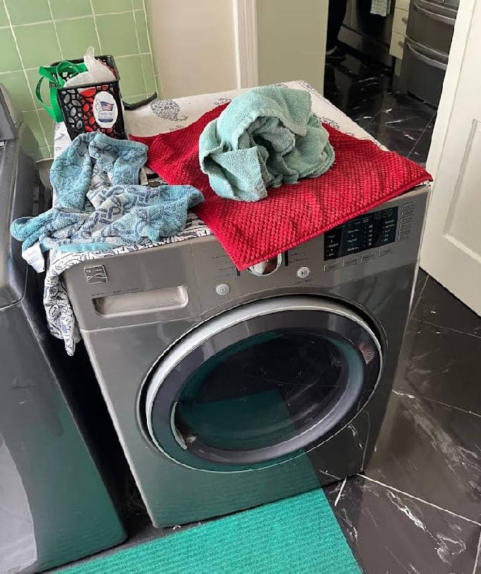 Kenmore washer repair in Oakton, VA — Door latch failure, drum refusing to spin mid-cycle