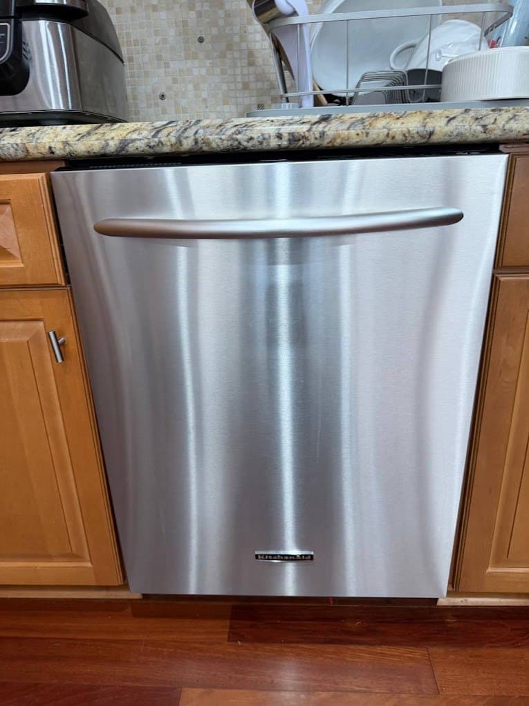 KitchenAid dishwasher repair in Alexandria, VA — Standing water in the tub after every cycle