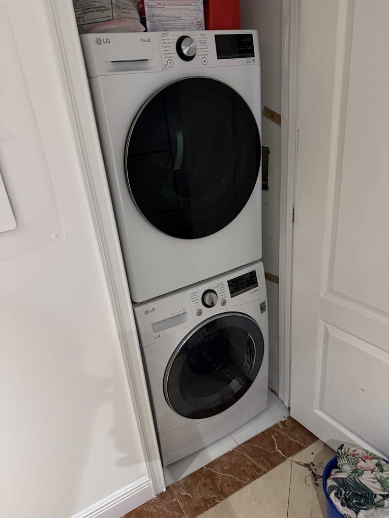 LG dryer repair in Springfield, VA — Stacked dryer drum not turning