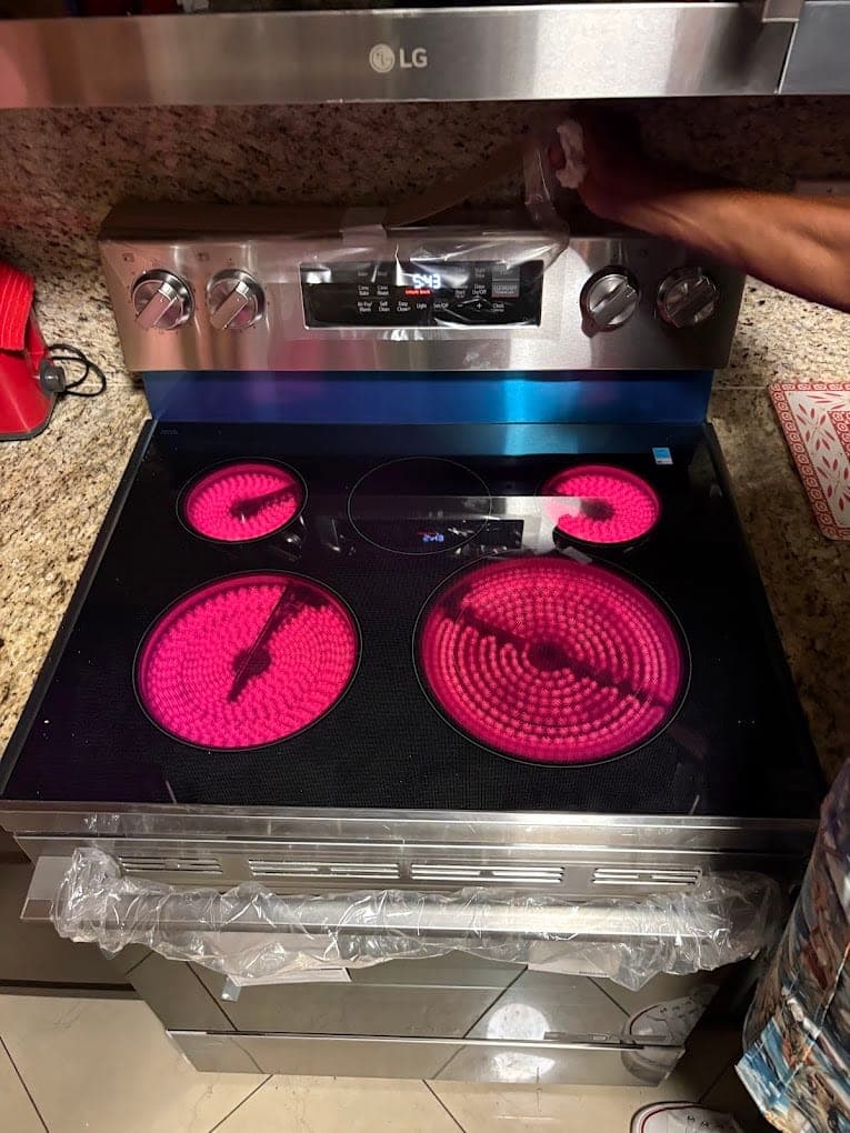 LG range repair in Tysons, VA — A heat test on all four elements after install