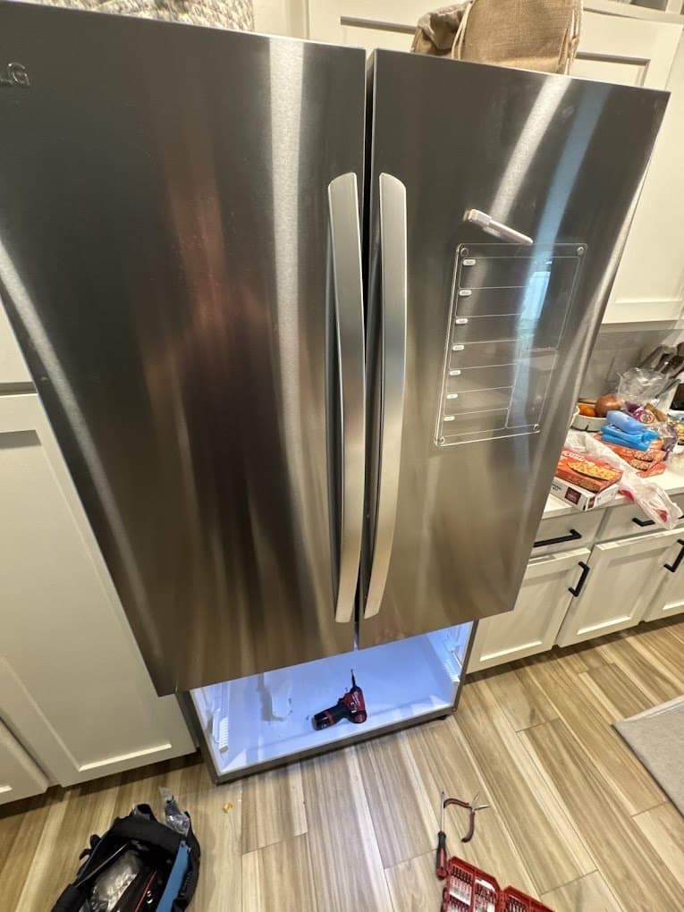 LG refrigerator repair in Burke, VA — Frost building in the freezer drawer