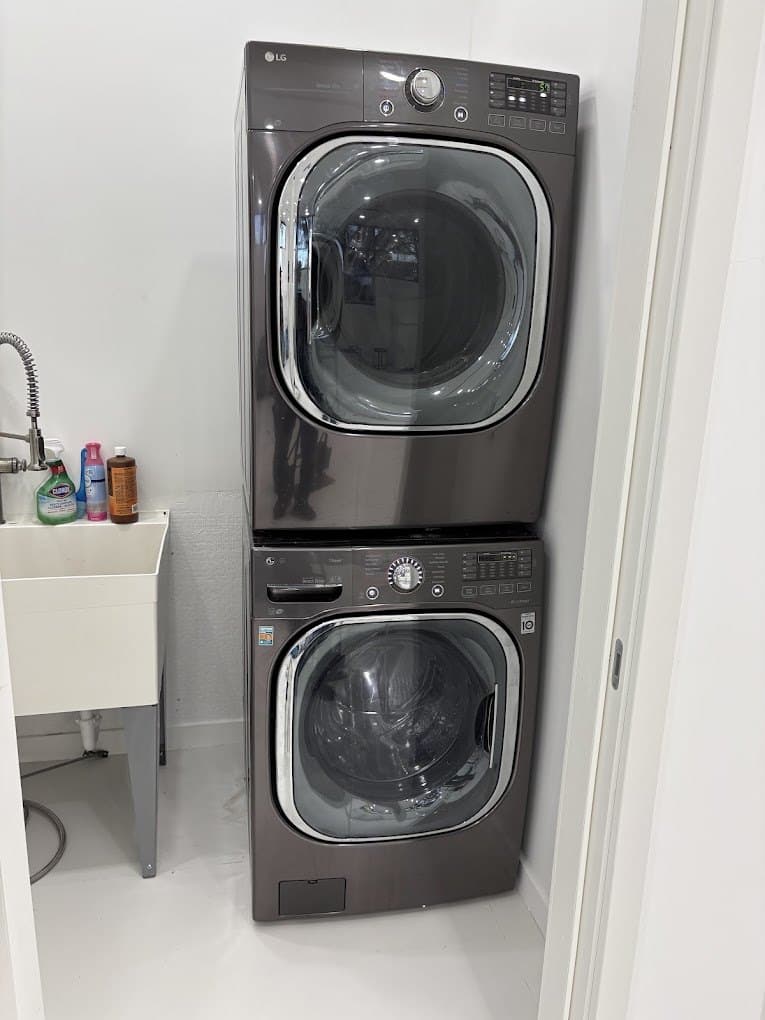 LG washer repair in Reston, VA — Stacked washer shaking hard on spin