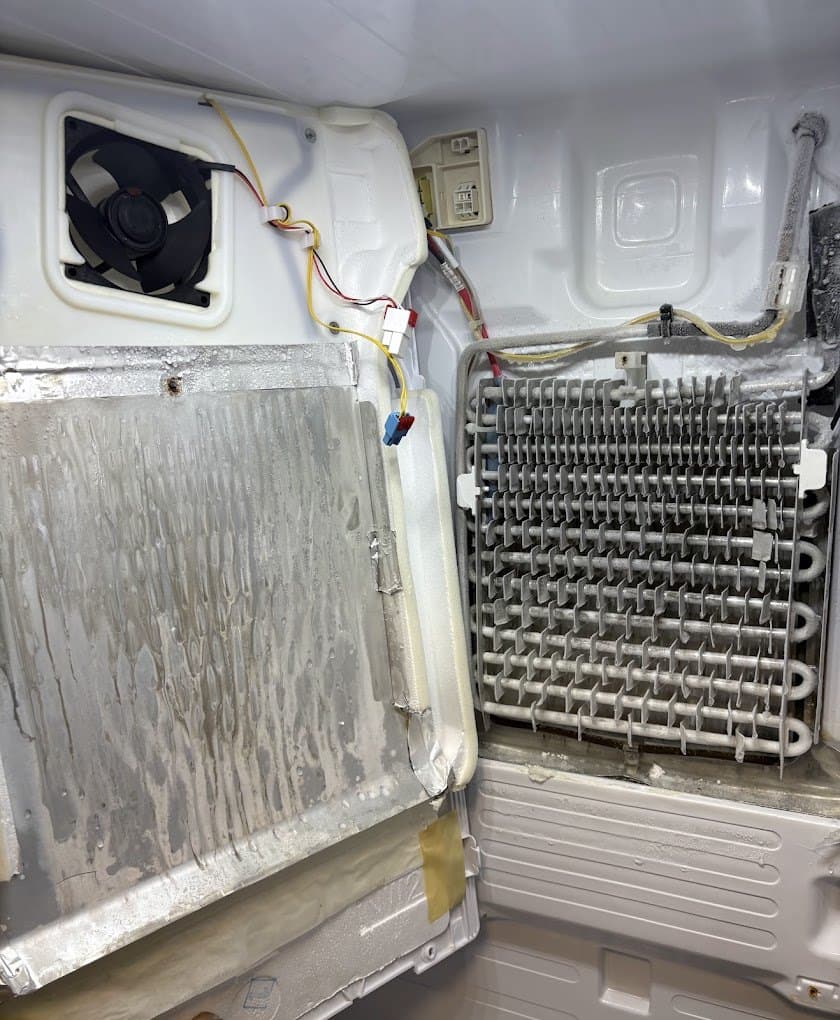 Maytag freezer repair in Herndon, VA — Freezer fan frozen in ice