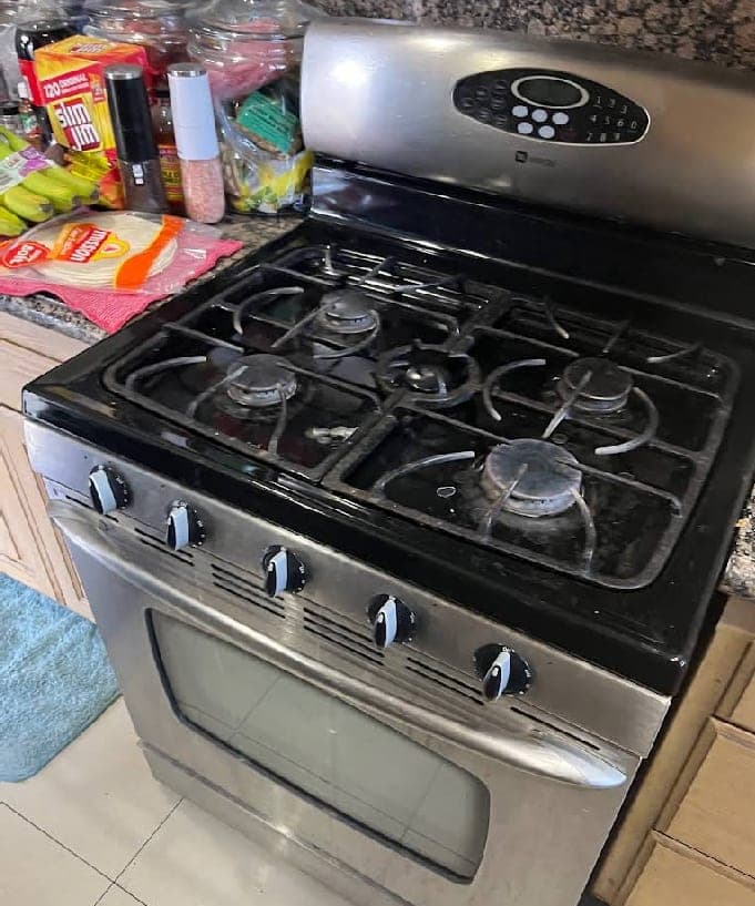 Maytag range repair in Arlington, VA — Front burner igniter clicking continuously with no flame igniting