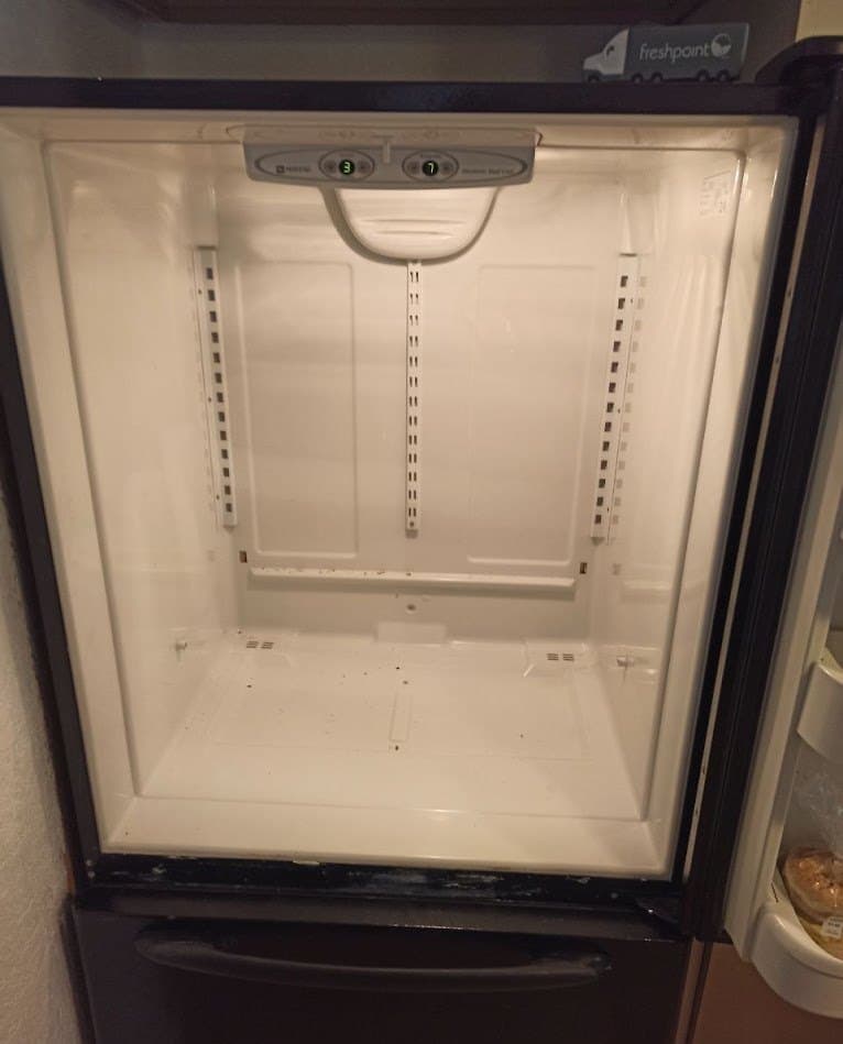 Maytag refrigerator repair in Centreville, VA — Bottom-freezer refrigerator warm, freezer frosting