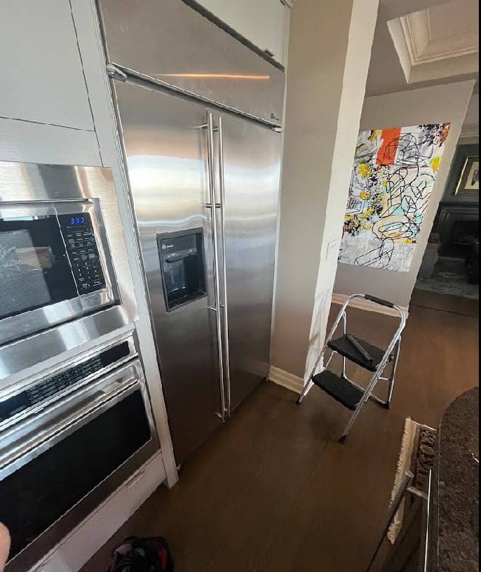 Monogram refrigerator repair in Fairfax, VA — Ice maker stopped producing ice, water inlet valve frozen and completely blocked