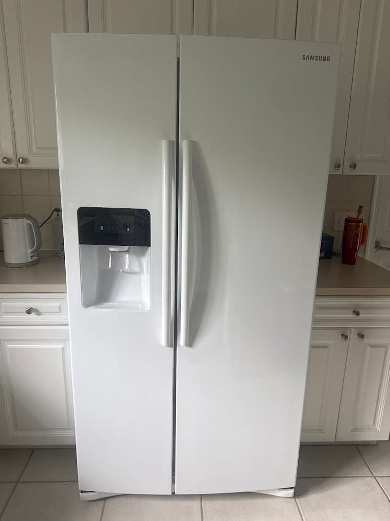 Samsung refrigerator repair in McLean, VA — No water at the dispenser and less ice
