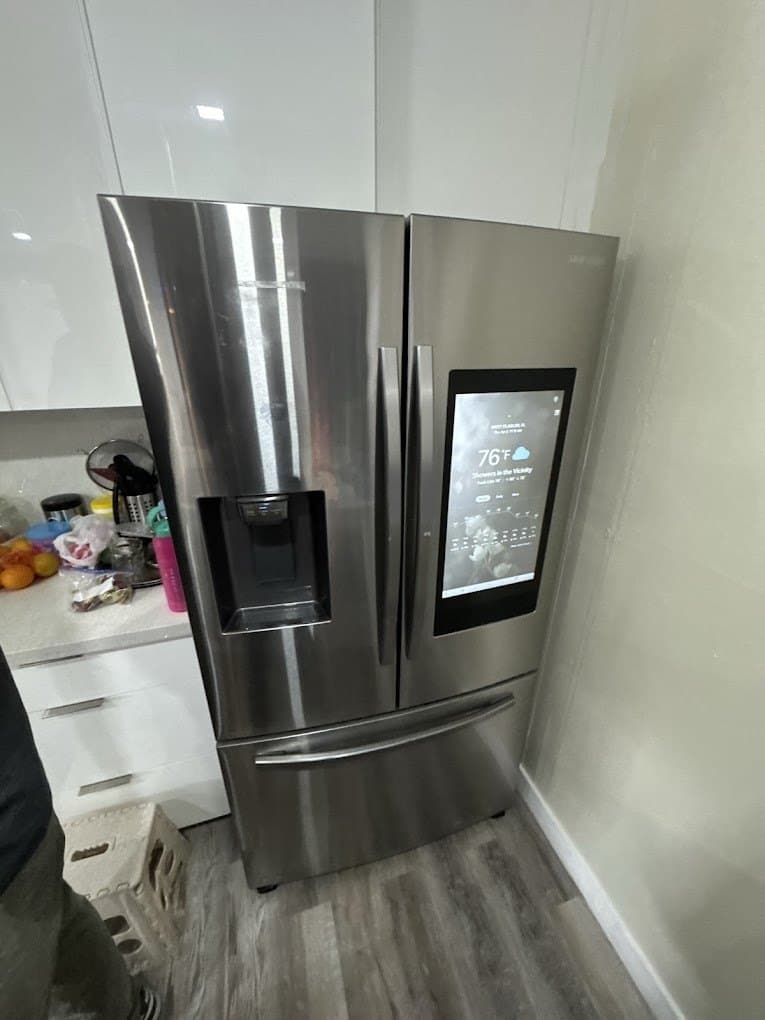 Samsung refrigerator repair in Arlington, VA — Family Hub refrigerator warm, screen still on