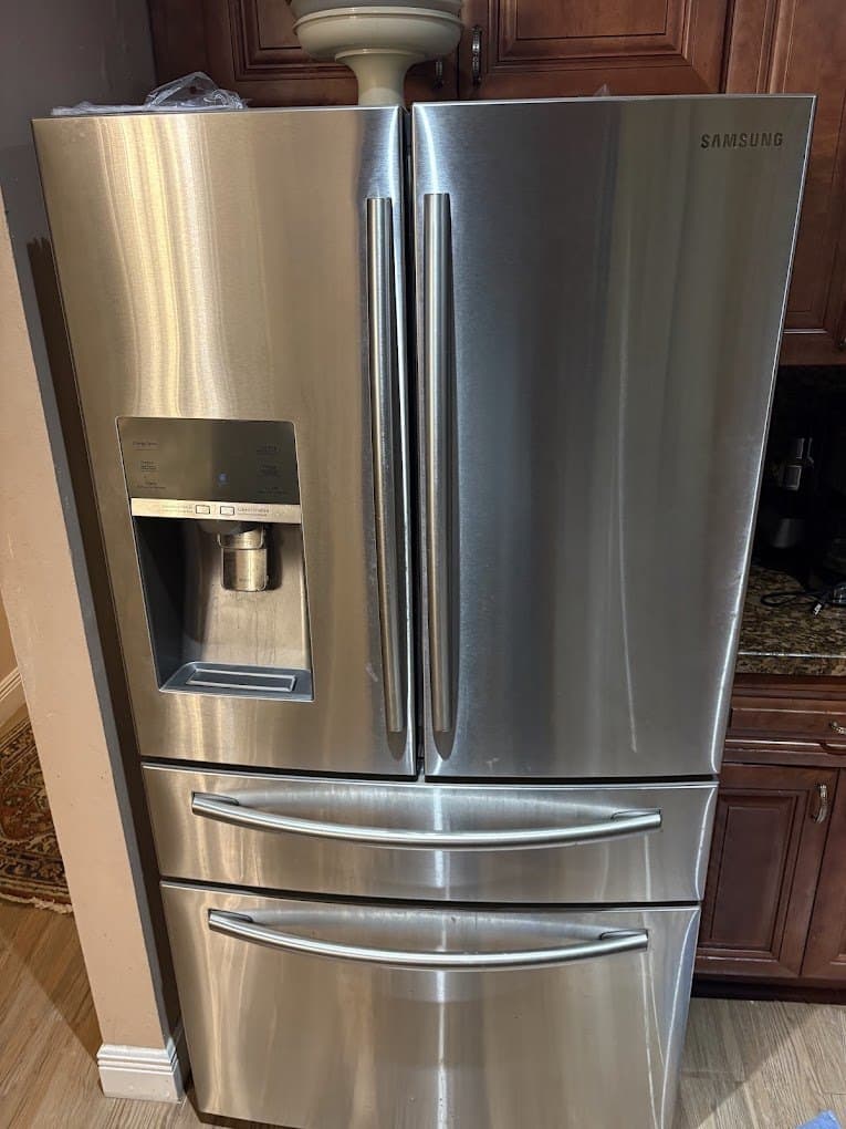 Samsung refrigerator repair in Centreville, VA — Refrigerator loud and freezer frosting