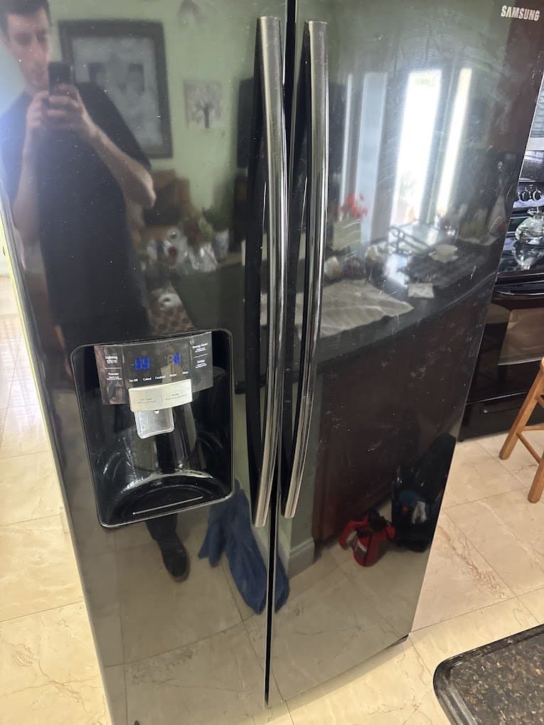 Samsung refrigerator repair in Leesburg, VA — Water leaking inside the refrigerator