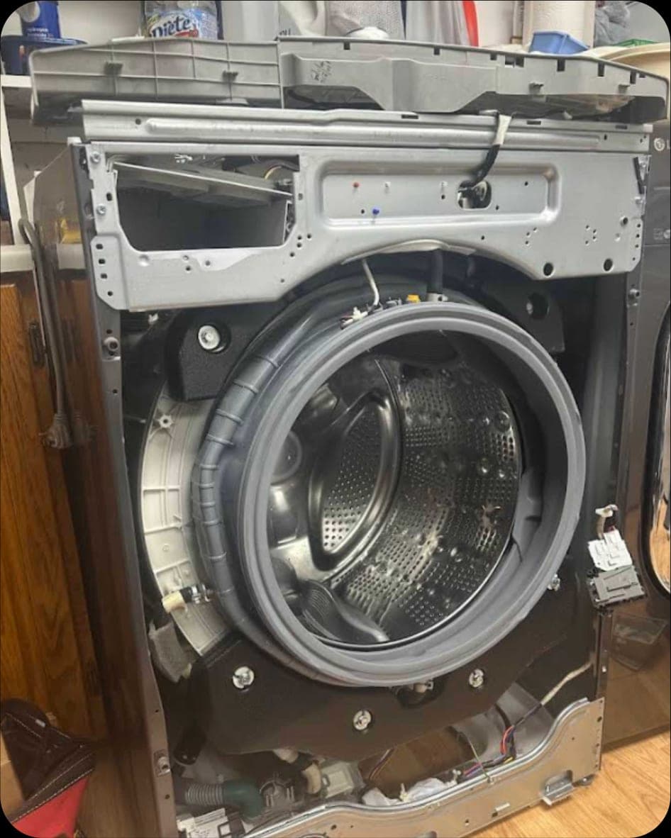LG washer repair in Falls Church, VA — Our technician fully disassembled the machine to access the drum, replaced the door boot gasket, and inspected the drain system to make sure everything was clear