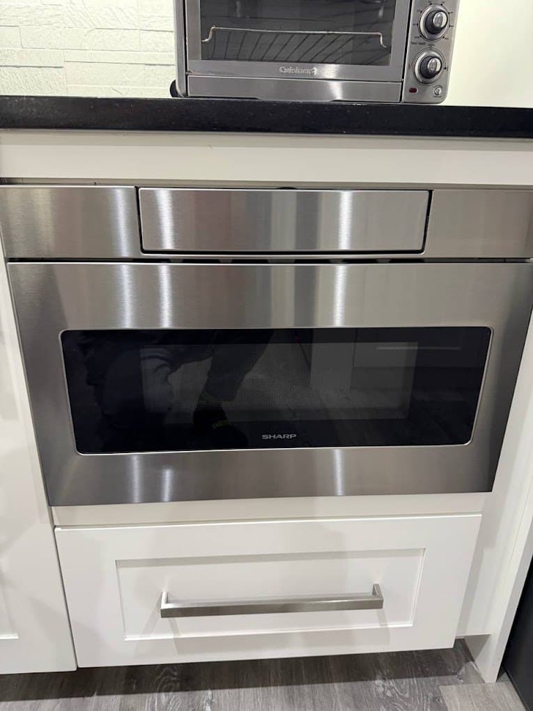 Sharp microwave repair in Centreville, VA — Microwave drawer would not open or close