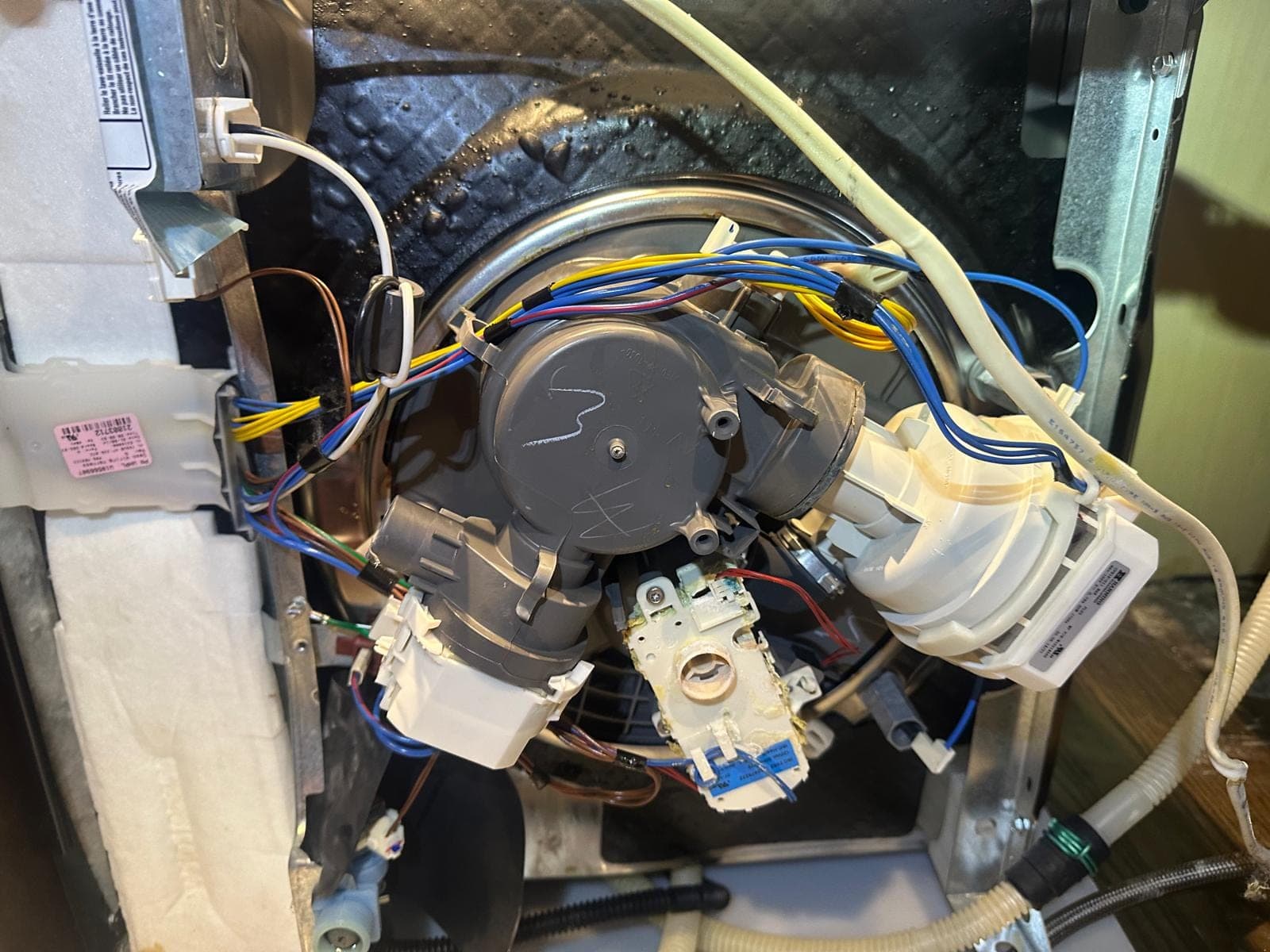 Whirlpool dishwasher repair in Falls Church, VA — Drain pump failure and standing water in the tub