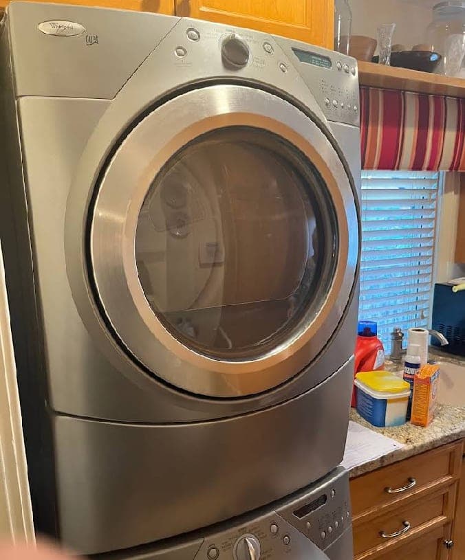 Whirlpool dryer repair in Falls Church, VA — Thermal fuse blown, drum spinning with no heat produced