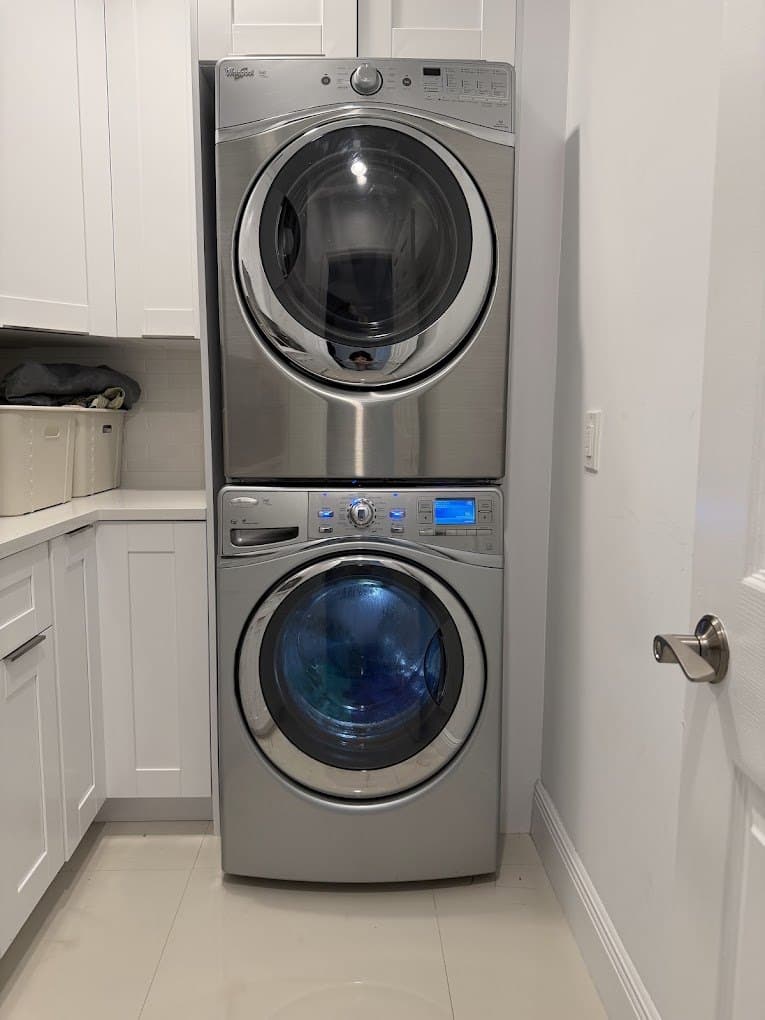 Whirlpool dryer repair in Arlington, VA — Stacked dryer on top not heating