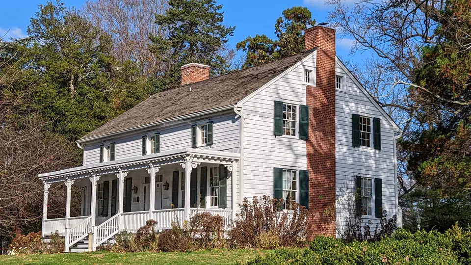 Cherry Hill Farmhouse, the historic white farmhouse in Cherry Hill Park beside City Hall in Falls Church, Virginia