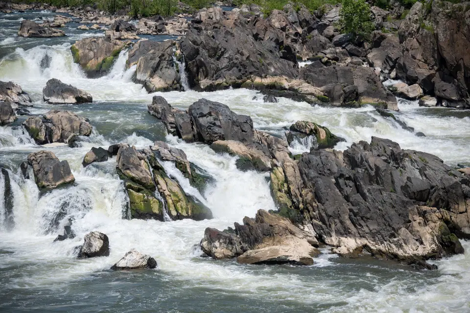 The Potomac River pouring over the rock ledges of Great Falls, seen from the Virginia side in Great Falls Park