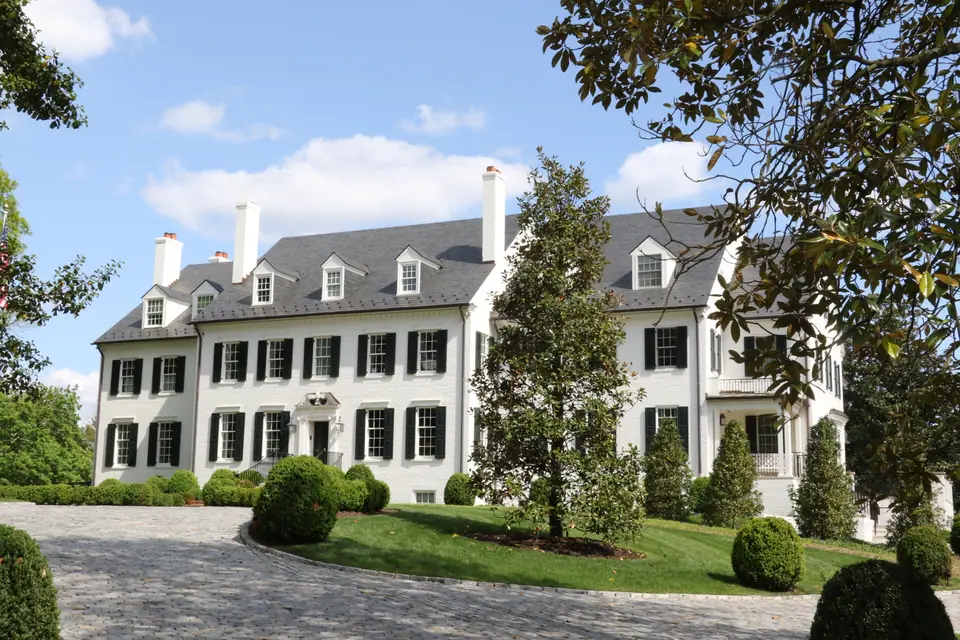 Hickory Hill, the historic white-painted brick estate house on Chain Bridge Road in McLean, Virginia, seen from its circular front drive