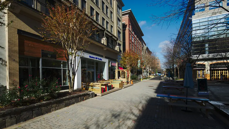 Gibbs Street, the pedestrian street through Rockville Town Square in Rockville, Maryland, with brick storefronts and outdoor seating