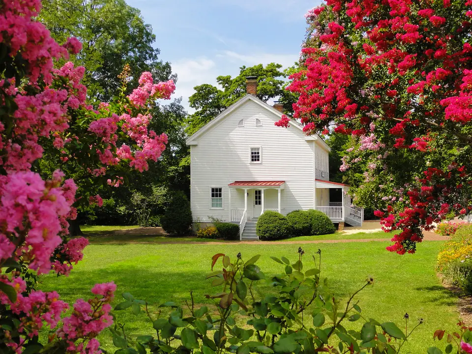 The historic Freeman Store and Museum on Church Street in Vienna, Virginia, with crepe myrtles in bloom on the lawn